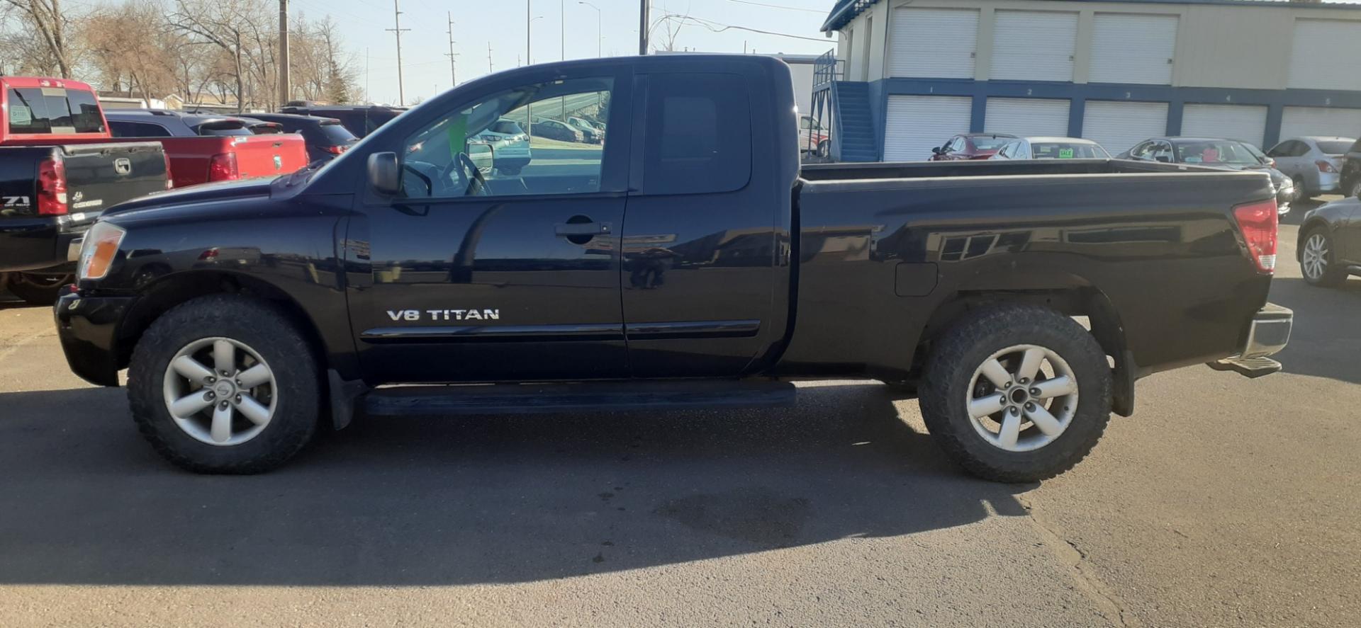 2010 Nissan Titan PRO-4X King Cab 4WD SWB (1N6AA0CJ3AN) with an 5.6L V8 DOHC 32V engine, 5-Speed Automatic transmission, located at 2015 Cambell Street, Rapid City, SD, 57701, (605) 342-8326, 44.066433, -103.191772 - CARFAX AVAILABLE - Photo#0